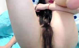 cute-asian-camgirl-exposes-her-hairy-beaver-and-lovely-feet