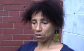Nasty Black Lady Drops Her Pants And Reveals Her Hairy Cunt
