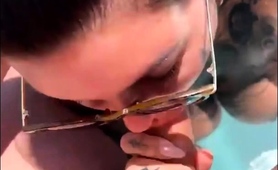 tattooed-british-milf-pool-blowjob