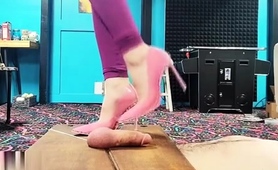 foot-fetish-mistress-in-high-heels-punishes-cock-and-balls