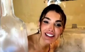 Big Boobed Webcam Model Having Solo Fun In The Hot Tub