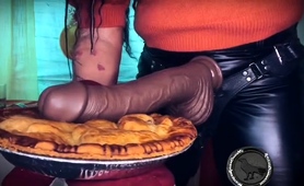 Food Fetish Obsessed Mistress Teases With Huge Strapon Toy