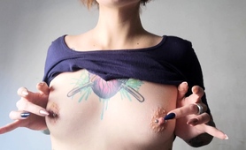 tattooed-milf-vixen-with-small-tits-plays-with-her-nipples