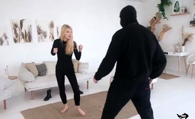 Busty blonde femdom wrestler dominates masked stranger